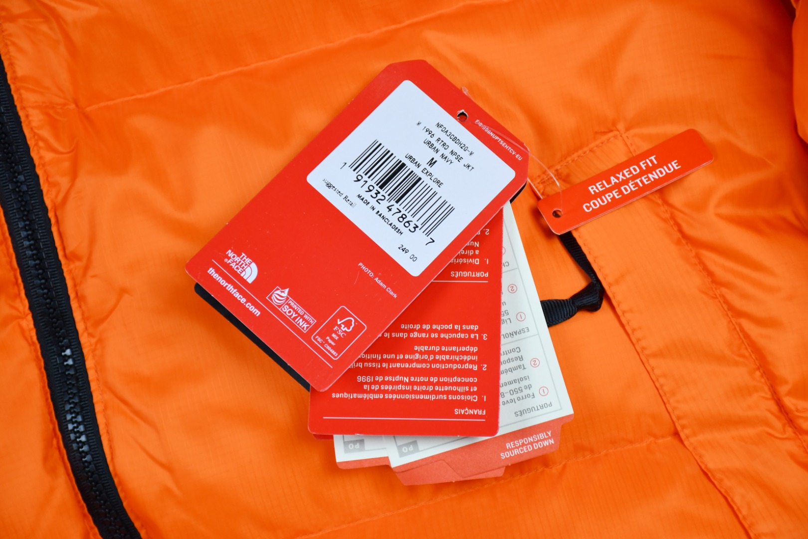 the n0*h f**e t*f 1996 down jacket orange