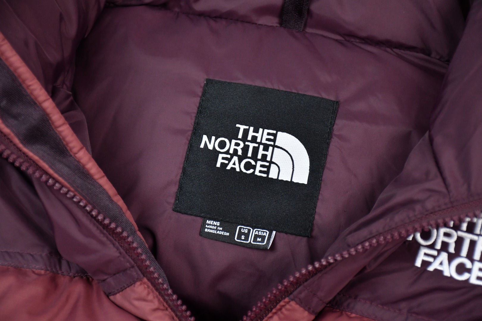 the n0*h f**e t*f 1996 down jacket burgundy