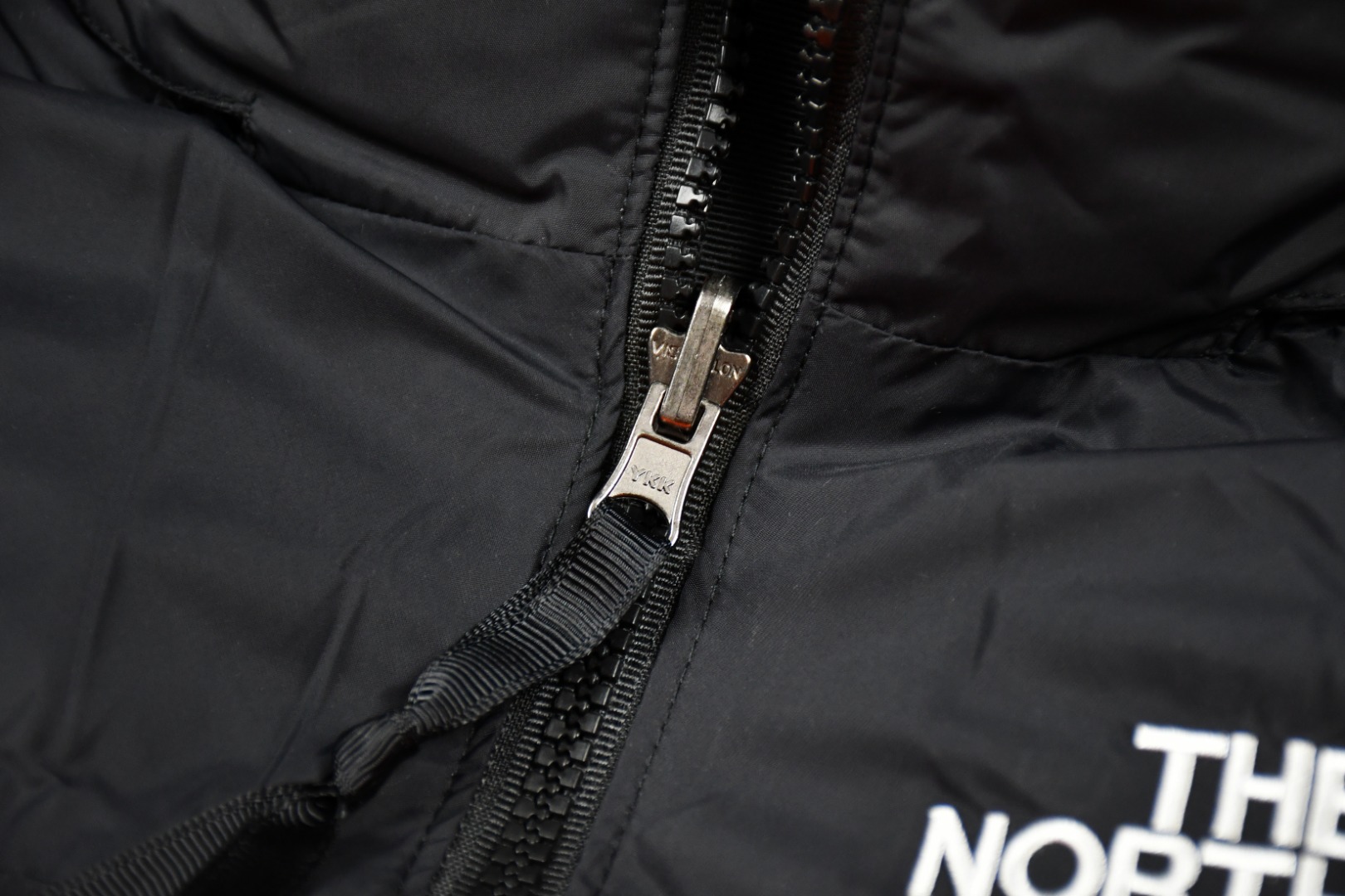 the n0*h f**e t*f 1996 down jacket orange