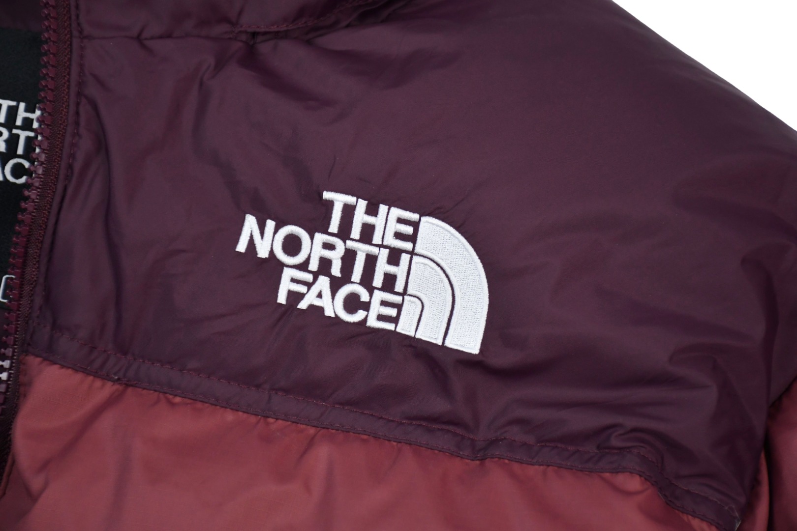 the n0*h f**e t*f 1996 down jacket burgundy
