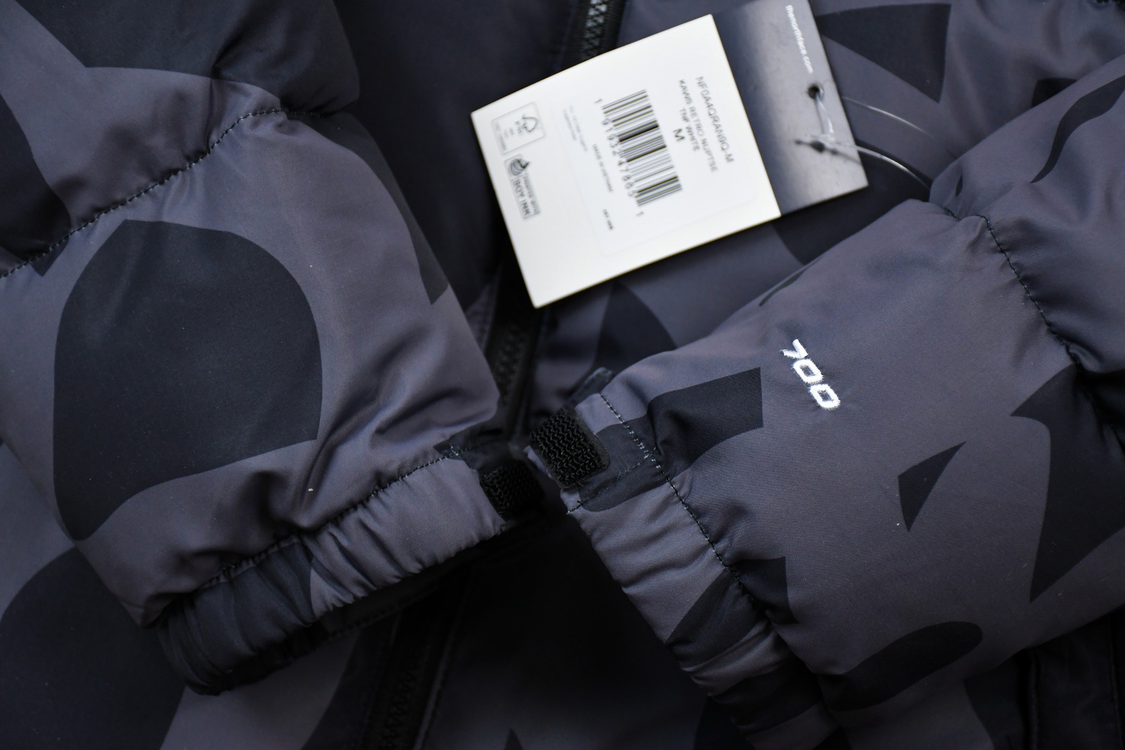kaws x the n0*h f**e t*f 1996 down jacket