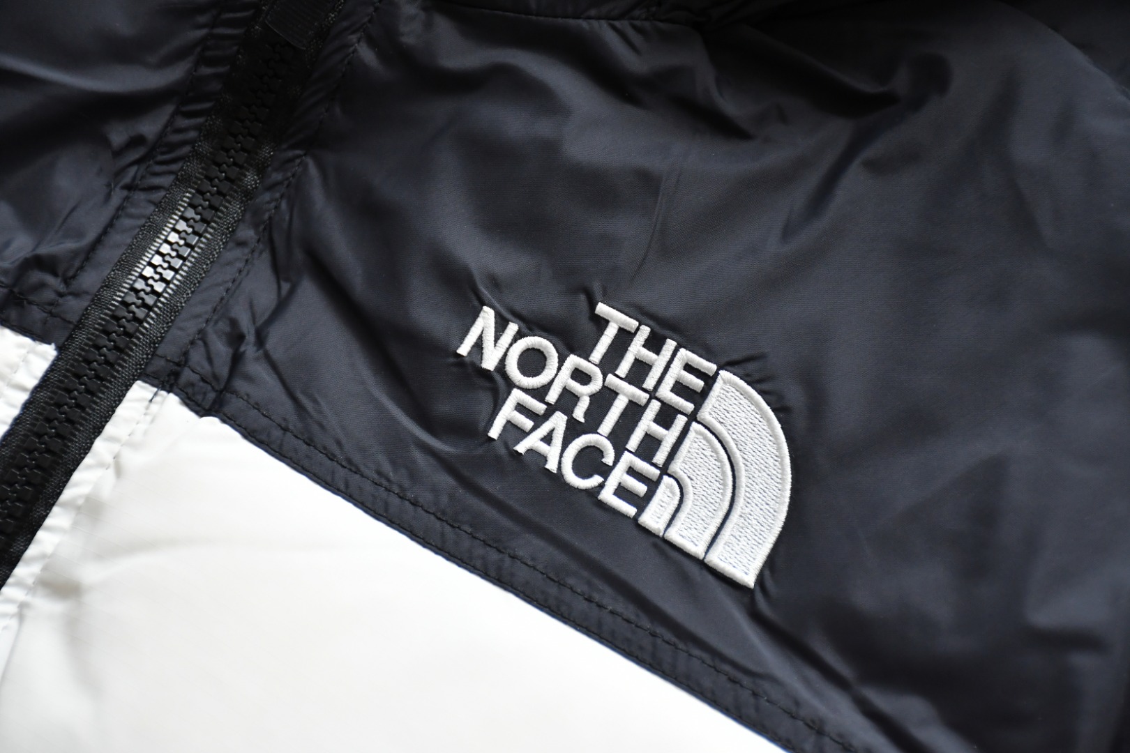 the n0*h f**e t*f 1996 down jacket white