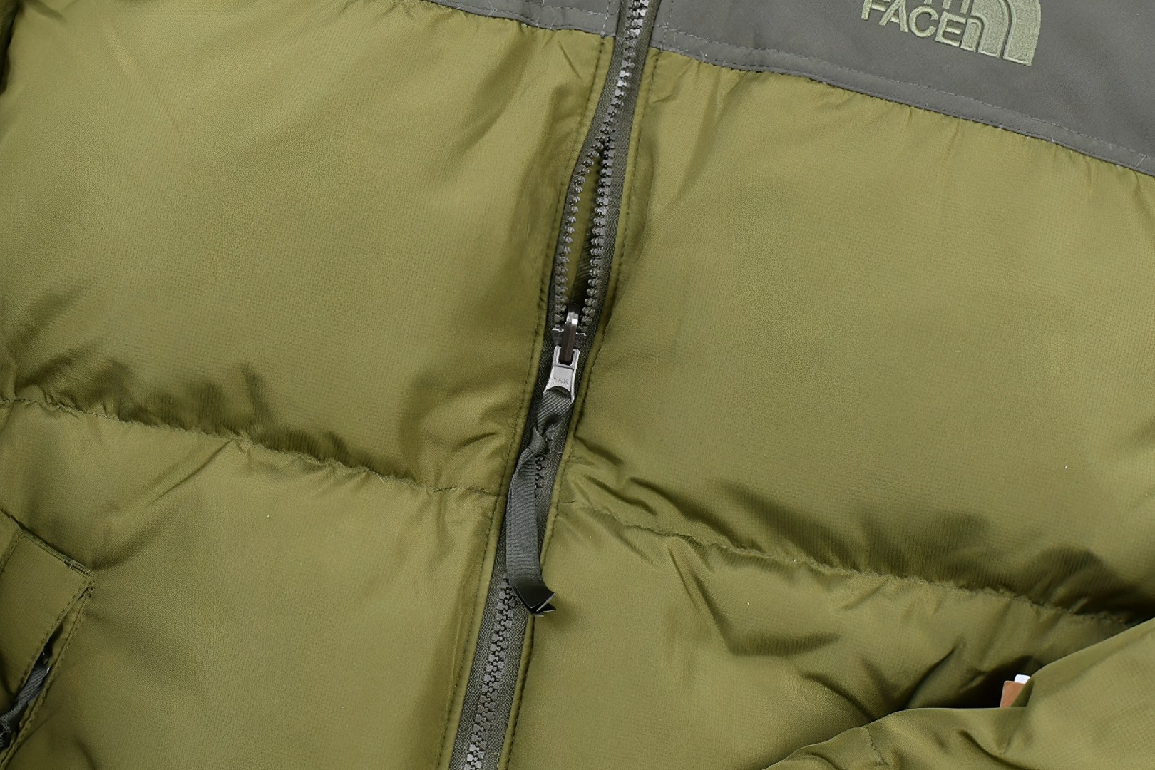 the n0*h f**e t*f 1996 down jacket army green